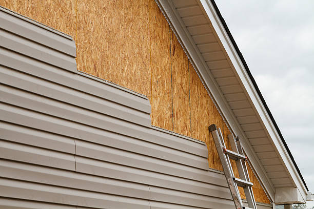 Professional Emergency Siding Repair technician working in Loretto, PA